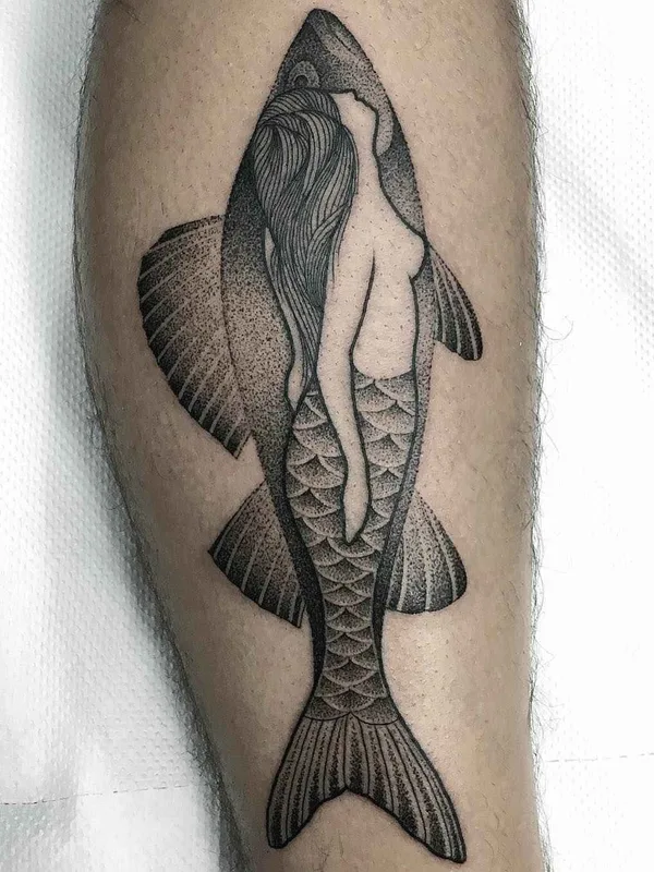 black and grey blackwork tattoo on calf #2980 | Tattoo Artist Mariusz Trubisz