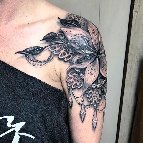 Black tattoo by Ryan Ashley Malarkey