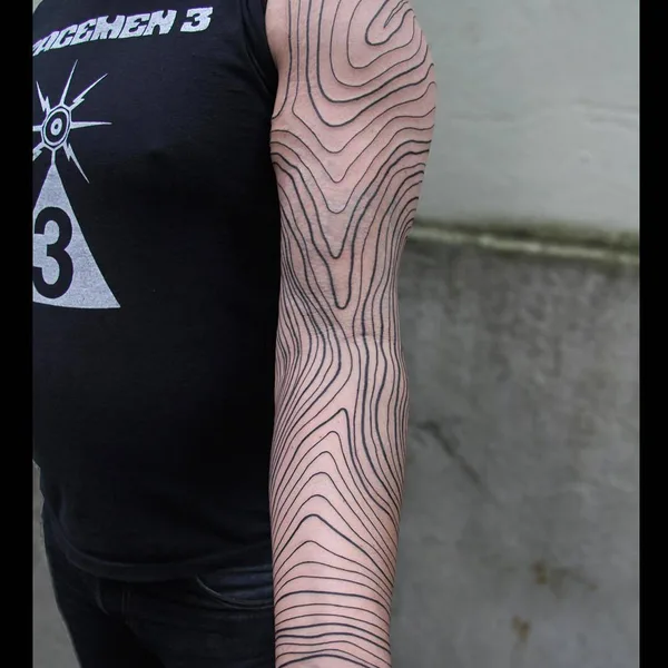Ornamental tattoo by Chaim Machlev in Berlin