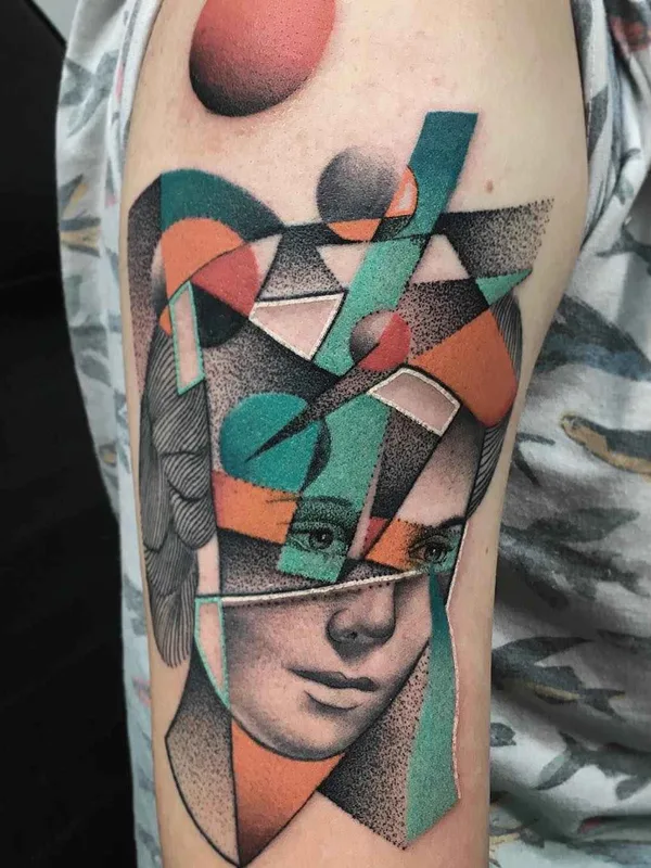 female color abstract tattoo on upper arm #2981 | Tattoo Artist Mariusz Trubisz