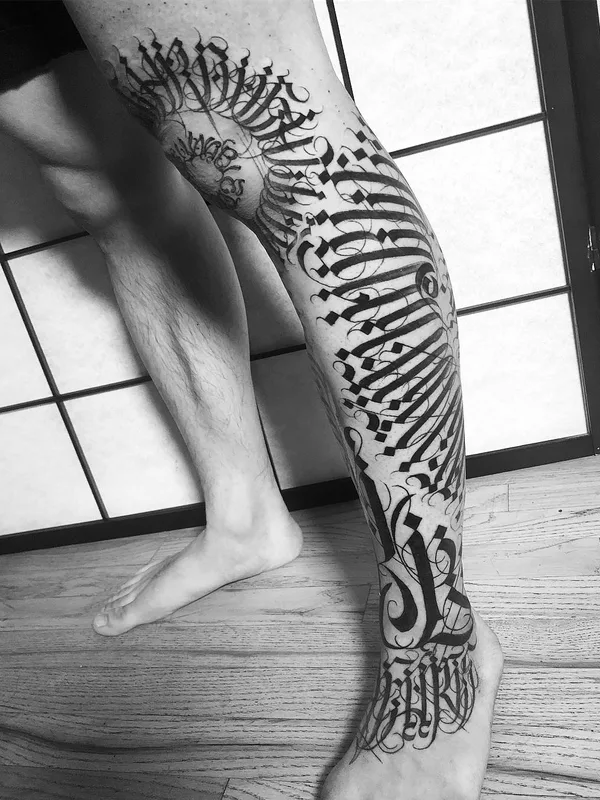 black calligraphy tattoo on full leg #29526 | Tattoo Artist MAYONAIZE