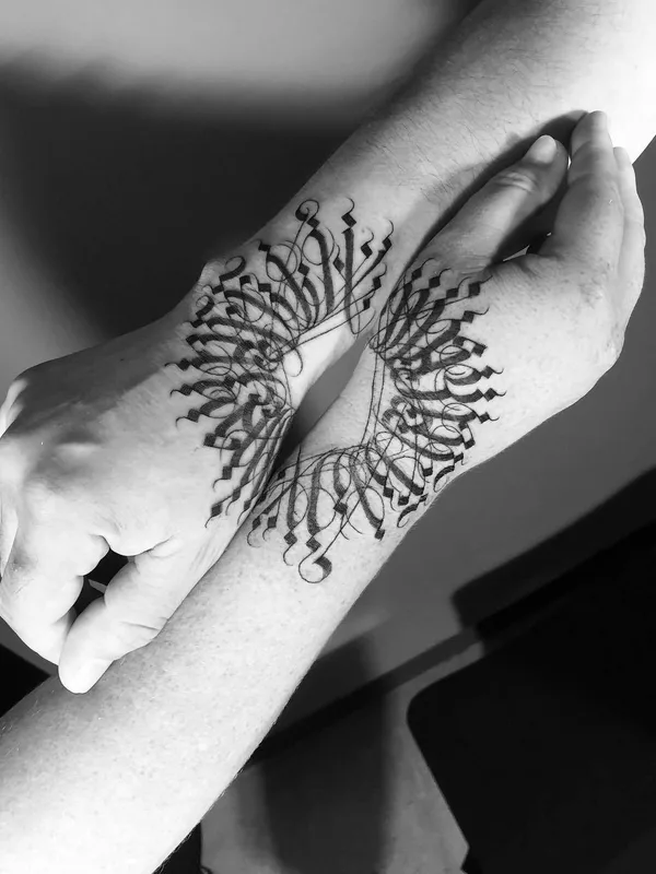 black calligraphy tattoo on wrist #29529 | Tattoo Artist MAYONAIZE