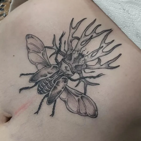 Graphic tattoo by Nadan Sarvan in Zagreb