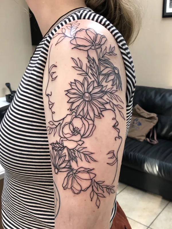 female black linework tattoo on upper arm #54512 | Tattoo Artist Blu