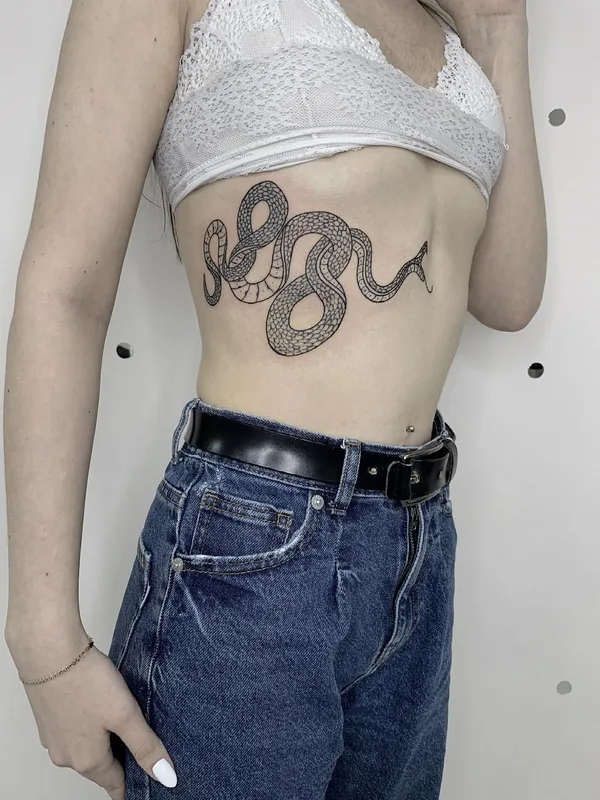 female black linework татуировка на ribcage #51469 | Тату мастер Света @sergadeeva_tattoo