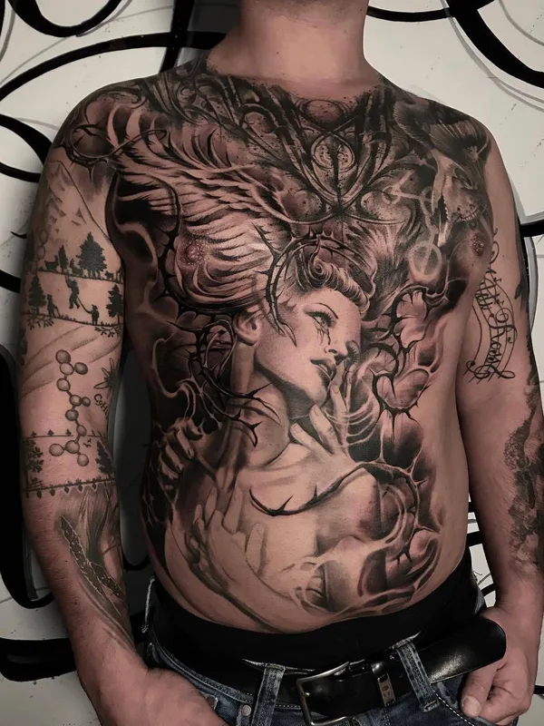 male black and grey realism tatuaje en chest #29108 | Tatuador Ivano Natale