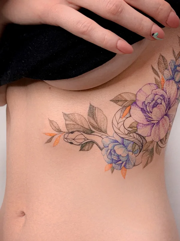 female color botanic tatuaje en side #57093 | Tatuador Olga Kotova