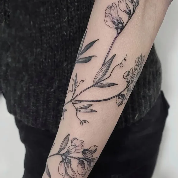 Botanical tattoo by Aija May in Rīga