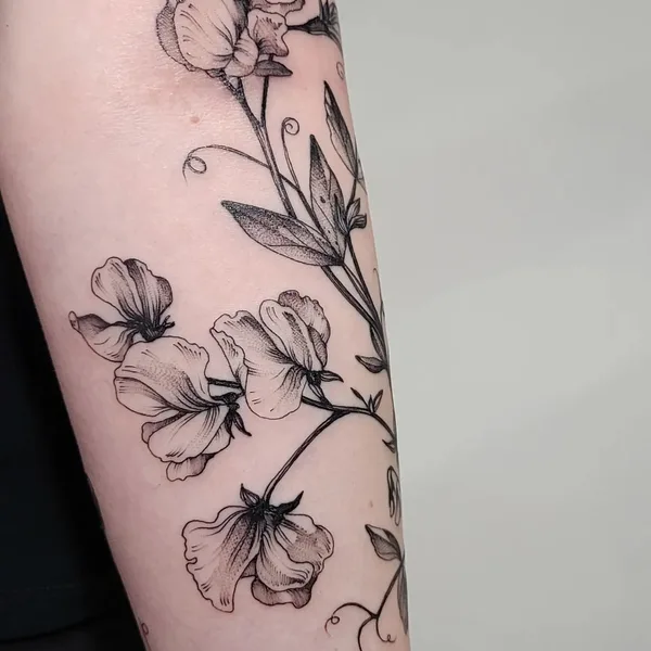 Botanical tattoo by Aija May in Rīga