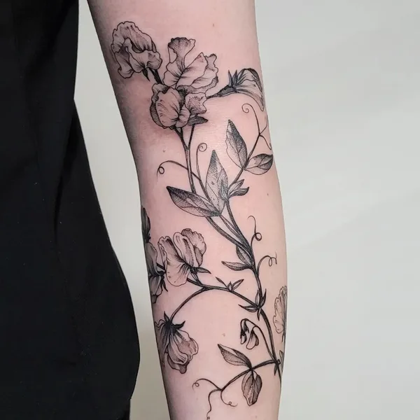Botanical tattoo by Aija May in Rīga