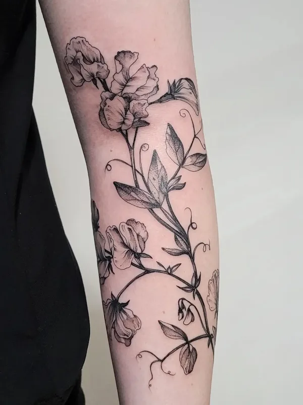 Botanical tattoo by Aija May in Rīga