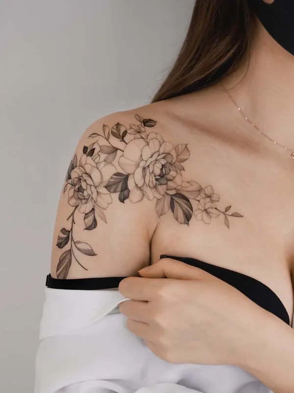 female black botanic tattoo on shoulder, collarbone #51597 | Tattoo Artist Zee