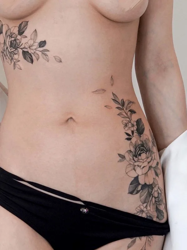 female black botanic tattoo on side #51603 | Tattoo Artist Zee