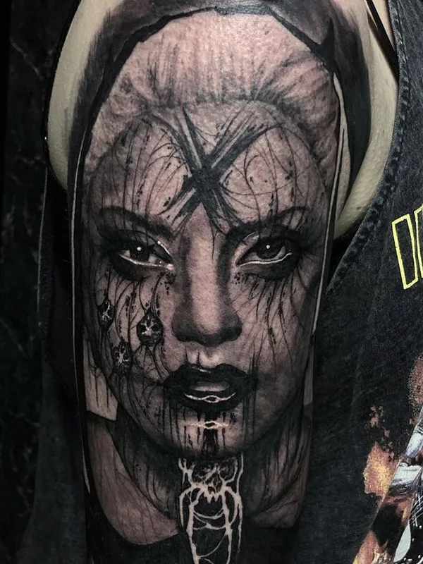 female black and grey black and grey tattoo on upper arm #66957 | Tattoo Artist Jyrke Savolainen