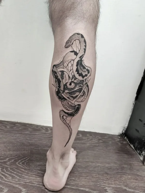 male black and grey blackwork Tatuaggio su calf #51767 | Tatuatore Илья Сергеев