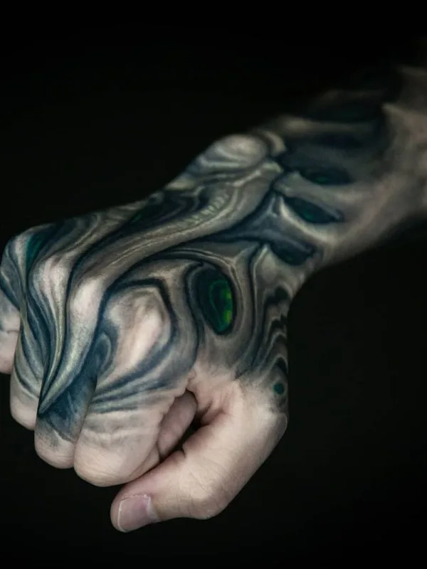 color biomechanical tattoo on hand #40652 | Tattoo Artist Степан Негур