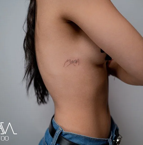 female black fineline tattoo on ribcage #43184 | Tattoo Artist Evan Kim