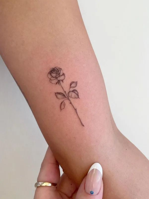 Minimalism tattoo by Jojo in Ontario