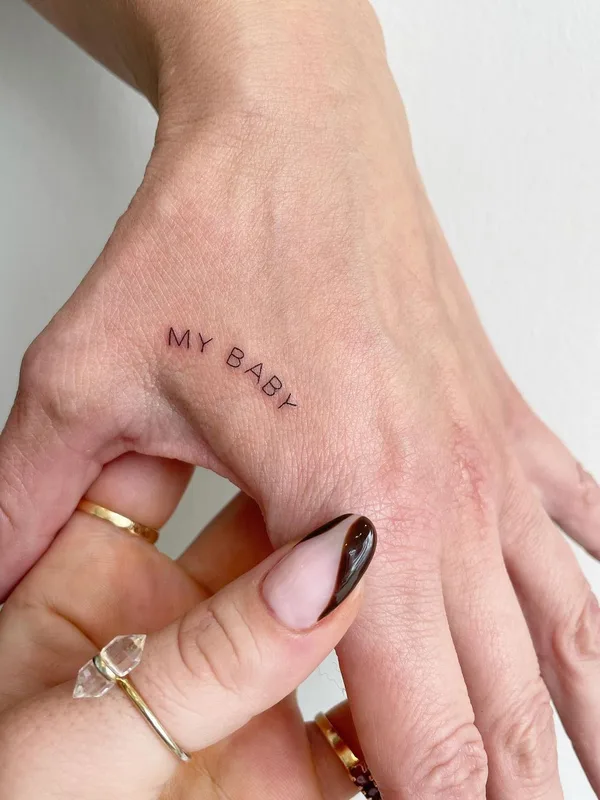 Minimalism tattoo by Jojo in Ontario