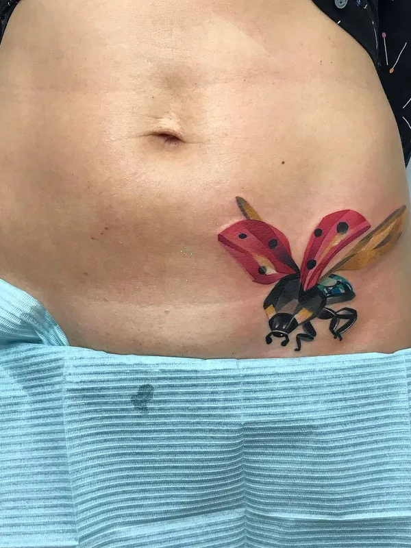 female color watercolor tattoo on stomach #27425 | Tattoo Artist Наталья Сажина
