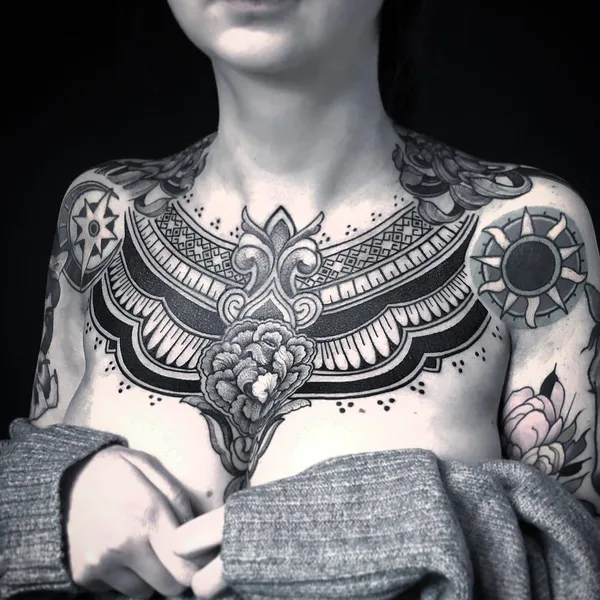 Graphic tattoo by Diamante Murru in Berlin