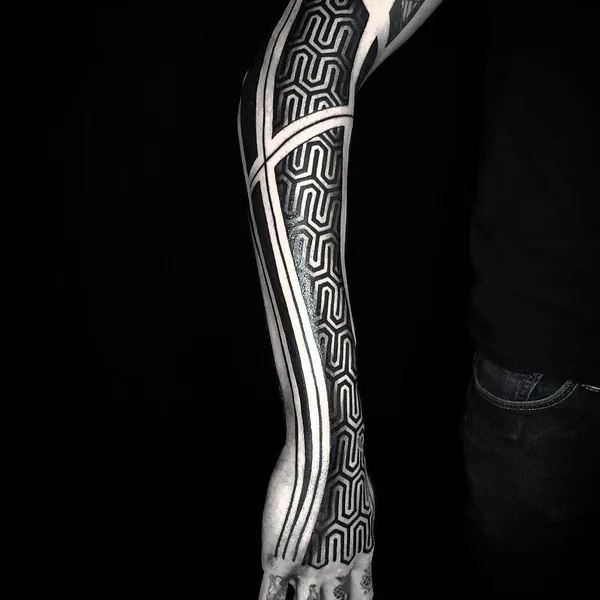 Graphic tattoo by Diamante Murru in Berlin