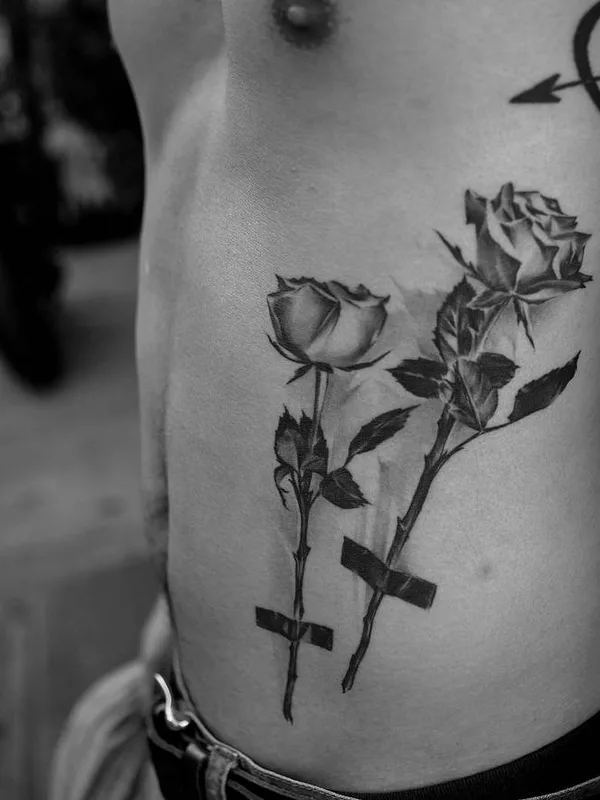 male black and grey black and grey tattoo on ribcage #29584 | Tattoo Artist Anatole