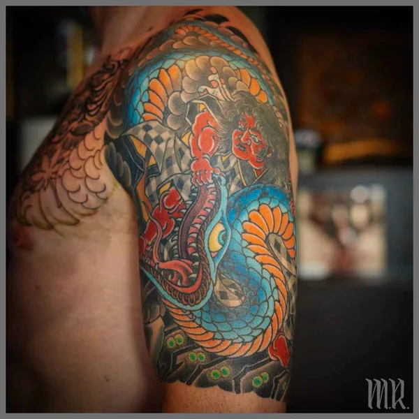 Traditional tattoo by Mike Rubendall