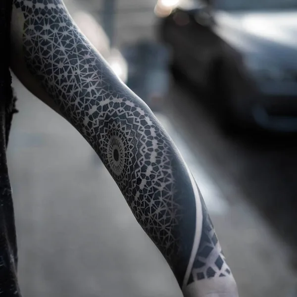 Ornamental tattoo by Dillon Forte in Austin