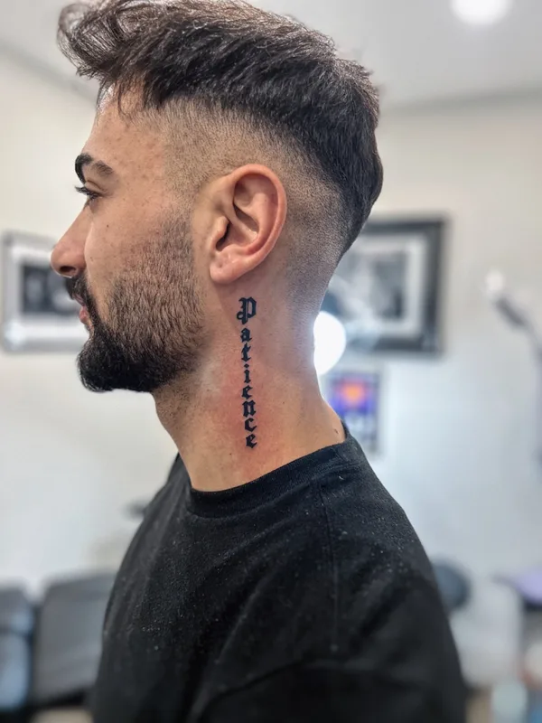 male black lettering татуировка на neck #63012 | Тату мастер Adam Kalelioglu