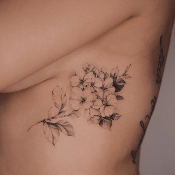 Feminine tattoo by Karolina Szymańska in Kraków