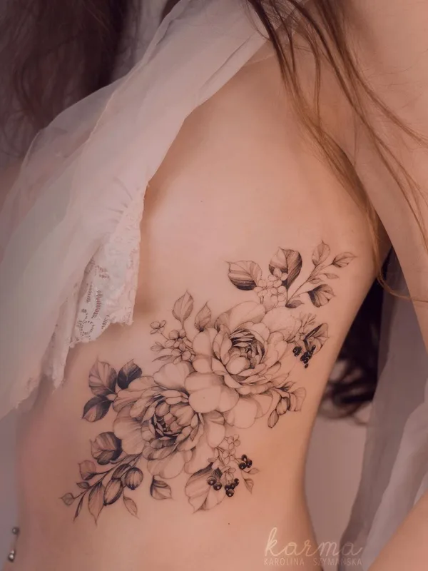 Feminine tattoo by Karolina Szymańska in Kraków