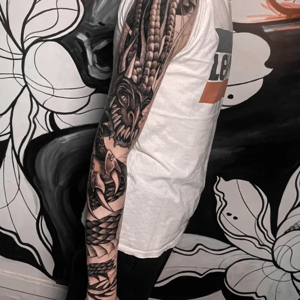 Graphic tattoo by Nika Nixttay in Saint Petersburg