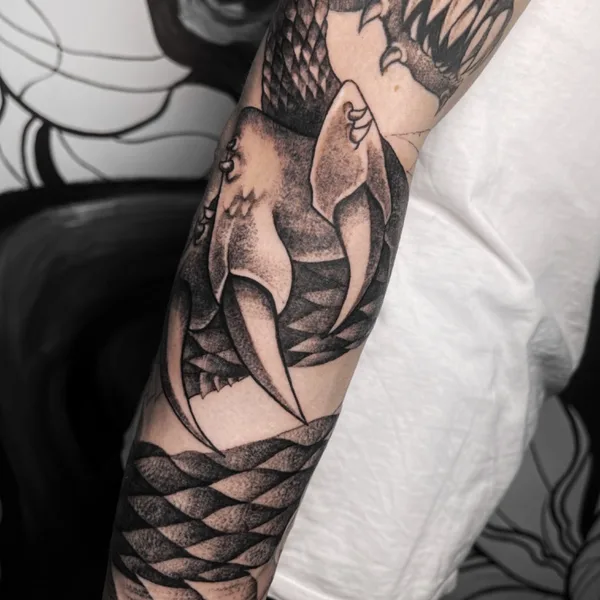 Graphic tattoo by Nika Nixttay in Saint Petersburg