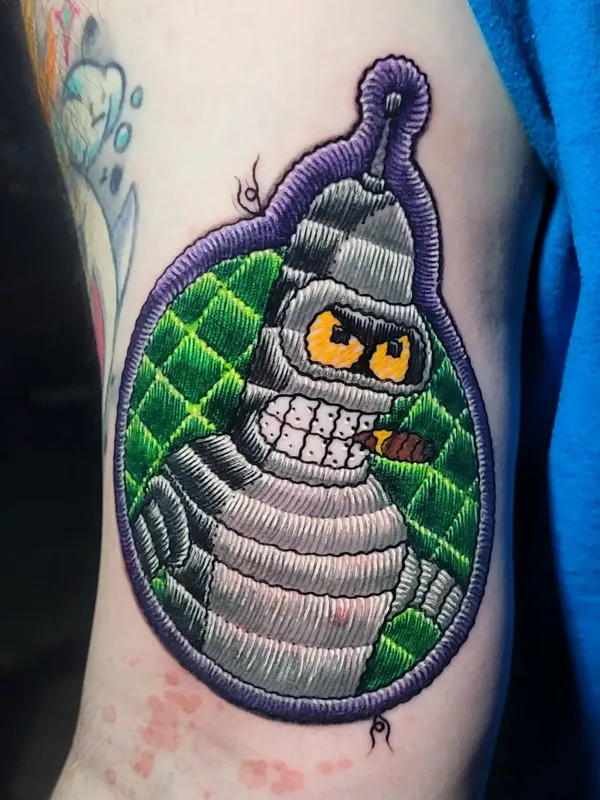 color cartoon Tatuagem em upper arm #68484 | Tatuador Justin Stiles