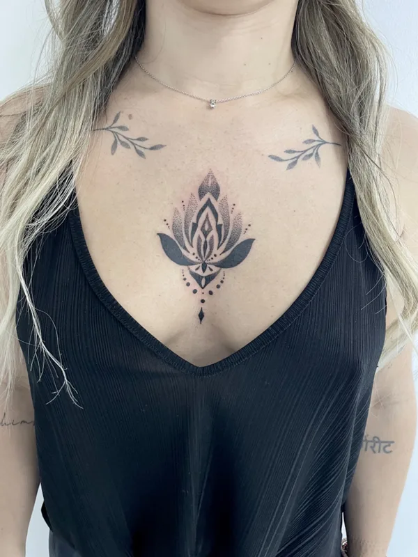 female black dotwork Tatuaggio su sternum #73887 | Tatuatore Naira Dots