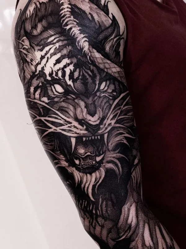 Graphic tattoo by Helena Zolotykh in Wrocław