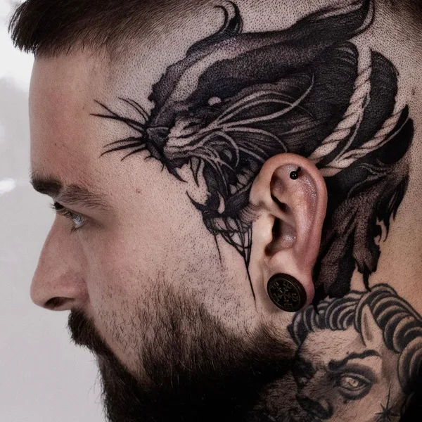 Graphic tattoo by Helena Zolotykh in Wrocław