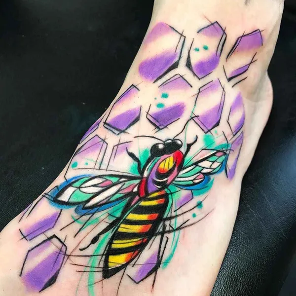 Graphic tattoo by Sebastian Barone in Málaga