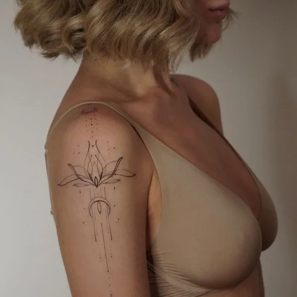Feminine tattoo by Алла Ягупова in Екатеринбург