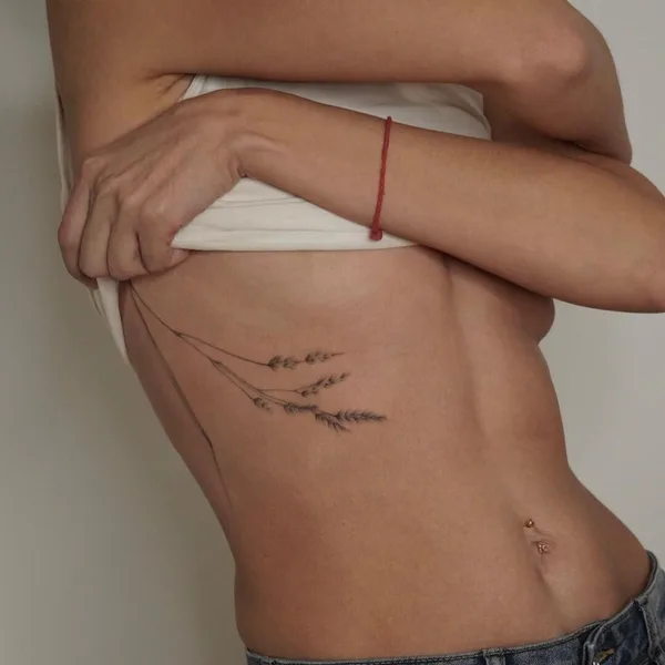 Feminine tattoo by Алла Ягупова in Екатеринбург