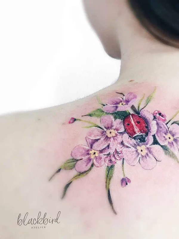 female color watercolor tattoo on shoulder blade #11978 | Tattoo Artist Luiza Oliveira