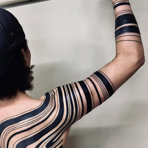 Tribal tattoo by Taku Oshima in Tokyo