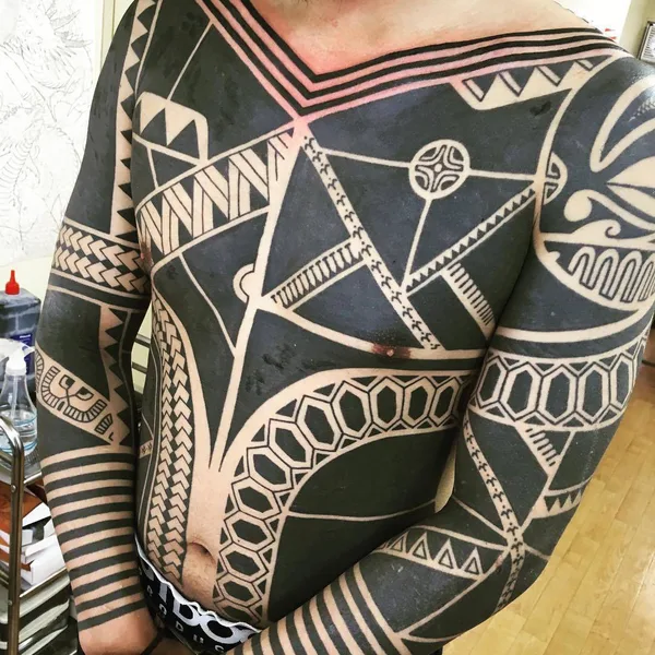Tribal tattoo by Taku Oshima in Tokyo