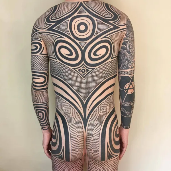 Tribal tattoo by Taku Oshima in Tokyo