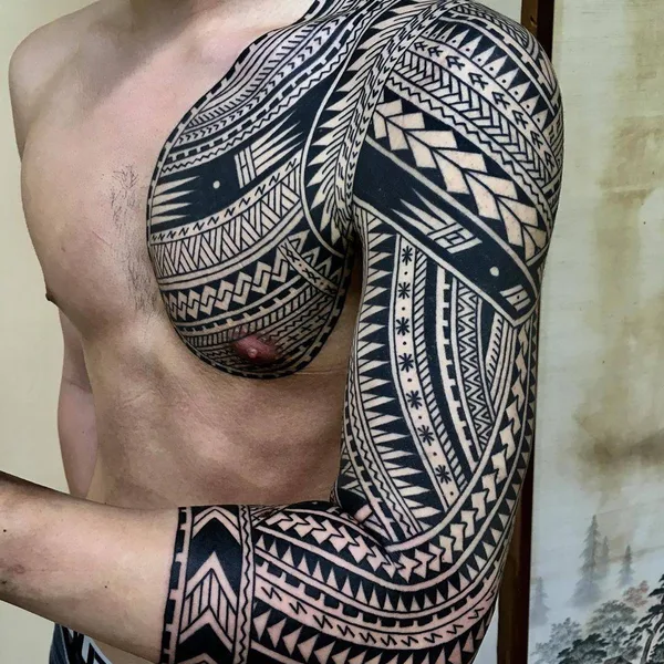 Tribal tattoo by Taku Oshima in Tokyo