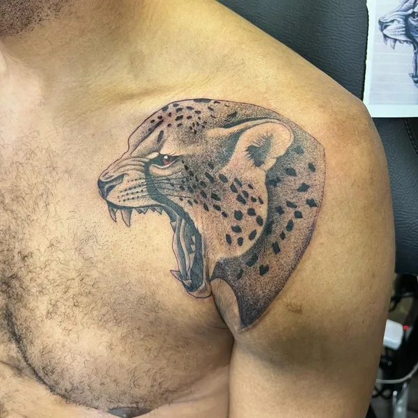 Graphic tattoo by Kamberly Ledford in Jackson