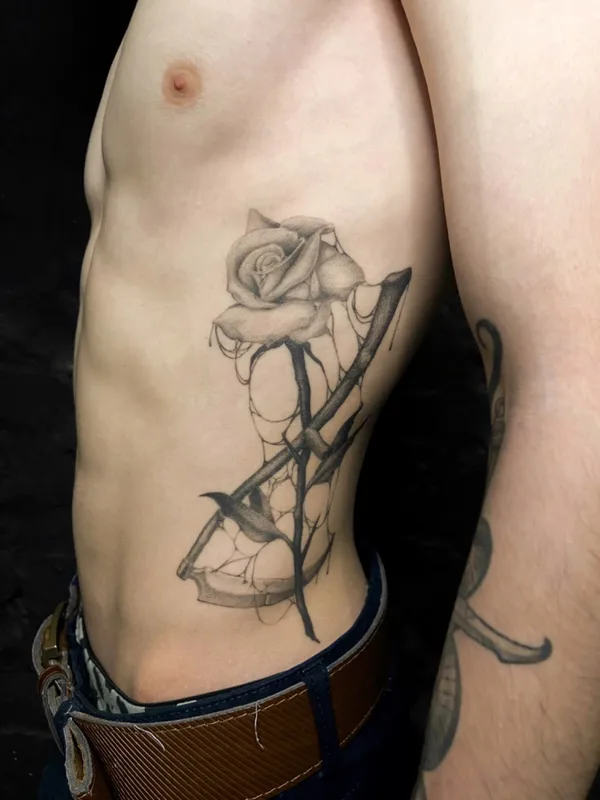 male black and grey black and grey tattoo on ribcage #60796 | Tattoo Artist Андрей Андрюхинский