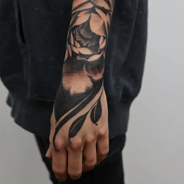 Botanical tattoo by Jordan Corneil in Lyon