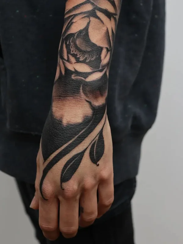 Botanical tattoo by Jordan Corneil in Lyon